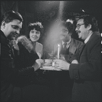 Al Carmines, Irene Fornes, Harry Koutoukas, and Larry Kornfeld sitting at table at Caffe Cino before performance of The White Whore and the Bit Player
