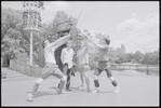 Performers rehearsing fight choreography (unidentified man in foreground backbent) for the stage production Henry IV, [Part I] at the Delacorte Theater