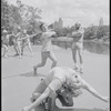 Performers rehearsing fight choreography (swords raised) for the stage production Henry IV, [Part I] at the Delacorte Theater