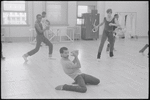Unidentified dancer (gesturing on knees) in rehearsal for the stage production Dreamgirls
