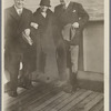 Robert H. Davis and two others on a boat