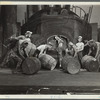 Men moving barrels