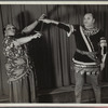 Minto Cato as Azucena and Parker Watkins as Manrico, swearing vengeance on a sword
