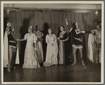 Parker Watkins with raised sword, and others