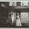 Man and woman pointing