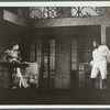 Rex Ingram pointing gun at woman