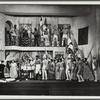 Rex Ingram, shirtless, with gun, and crowd