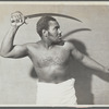 Rex Ingram, shirtless, with cutlass