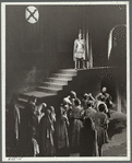 Man standing above crowd