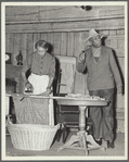 Woman ironing, man talking