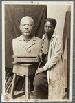 Selma Burke with her portrait bust of Booker T. Washington
