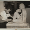 Francisco Lord working on sculpture