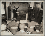 Music class with instructor at the board