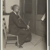 A cello student of the Adult Education Classes under the Federal Music Project at Carlton YMCA