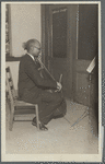 A cello student of the Adult Education Classes under the Federal Music Project at Carlton YMCA