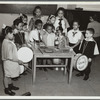 Drum students around a table