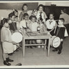 Drum students around a table