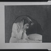 Montage (woman seated on bed)