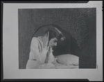Montage (woman seated on bed)