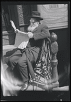 Man reading newspaper