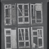 Children in the windows of an abandoned building