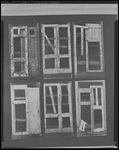 Children in the windows of an abandoned building