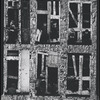 Children in the windows of an abandoned building