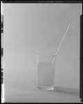 Glass of water with straw