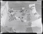 Sid Grossman and others on a pier. Provincetown, MA