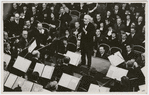 Postcard depicting Arturo Toscanini conducting the Vienna Philharmonic Orchestra