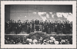 Postcard depicting Arturo Toscanini conducting an orchestra