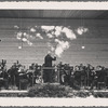 Postcard depicting Arturo Toscanini conducting an orchestra