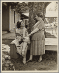 Fannia M. Cohn in garden with a young girl