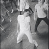 [B3-22B] Peter Gennaro directing dancers during rehearsal for the stage production West Side Story