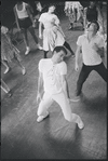 [B3-22B] Peter Gennaro directing dancers during rehearsal for the stage production West Side Story