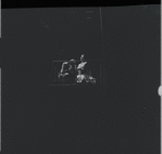 Carol Lawrence and Larry Kert on a fire escape in scene from the stage production West Side Story