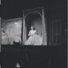 Carol Lawrence kneeling before altar in bedroom scene from the stage production West Side Story