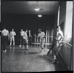 Jerome Robbins and dancers rehearse fight scene for the stage production West Side Story