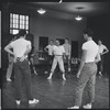 Jerome Robbins and dancers rehearse fight scene for the stage production West Side Story