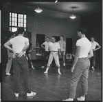 Jerome Robbins and dancers rehearse fight scene for the stage production West Side Story