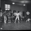 Jerome Robbins and dancers rehearse fight scene for the stage production West Side Story