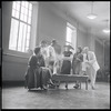 Jean Rosenthal[?], Leonard Bernstein, Arthur Laurents (obscured), Jerome Robbins (foreground), Stephen Sondheim (obscured), Irene Sharaff, Sylvia Drulie, and Robert E. Griffith in rehearsal for the stage production West Side Story