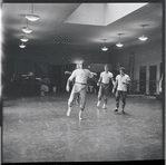 Jerome Robbins directs dancers in rehearsal for the stage production West Side Story