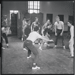 Dancers rehearse fight scene for the stage production West Side Story