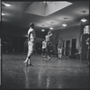 Jerome Robbins directing dancers rehearsing the stage production West Side Story