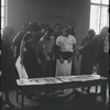 Jean Rosenthal, Irene Sharaff, Arthur Laurents, Leonard Bernstein, Jerome Robbins, Sylvia Drulie, and Robert E. Griffith consulting Sharaff's costume designs during rehearsal for the stage production West Side Story