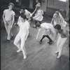 Peter Gennaro directing dancers during rehearsal for the stage production West Side Story