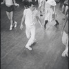 Peter Gennaro directing dancers during rehearsal for the stage production West Side Story