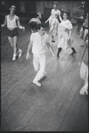 Peter Gennaro directing dancers during rehearsal for the stage production West Side Story