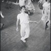 Peter Gennaro directing dancers during rehearsal for the stage production West Side Story